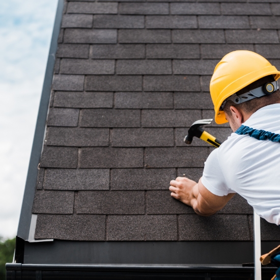 back-view-of-handyman-in-uniform-and-helmet-repair-2024-11-17-08-37-15-utc